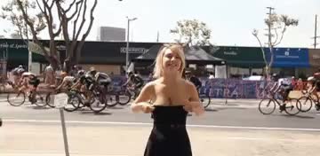 Flashing while a bicycle race is going on. [GIF]