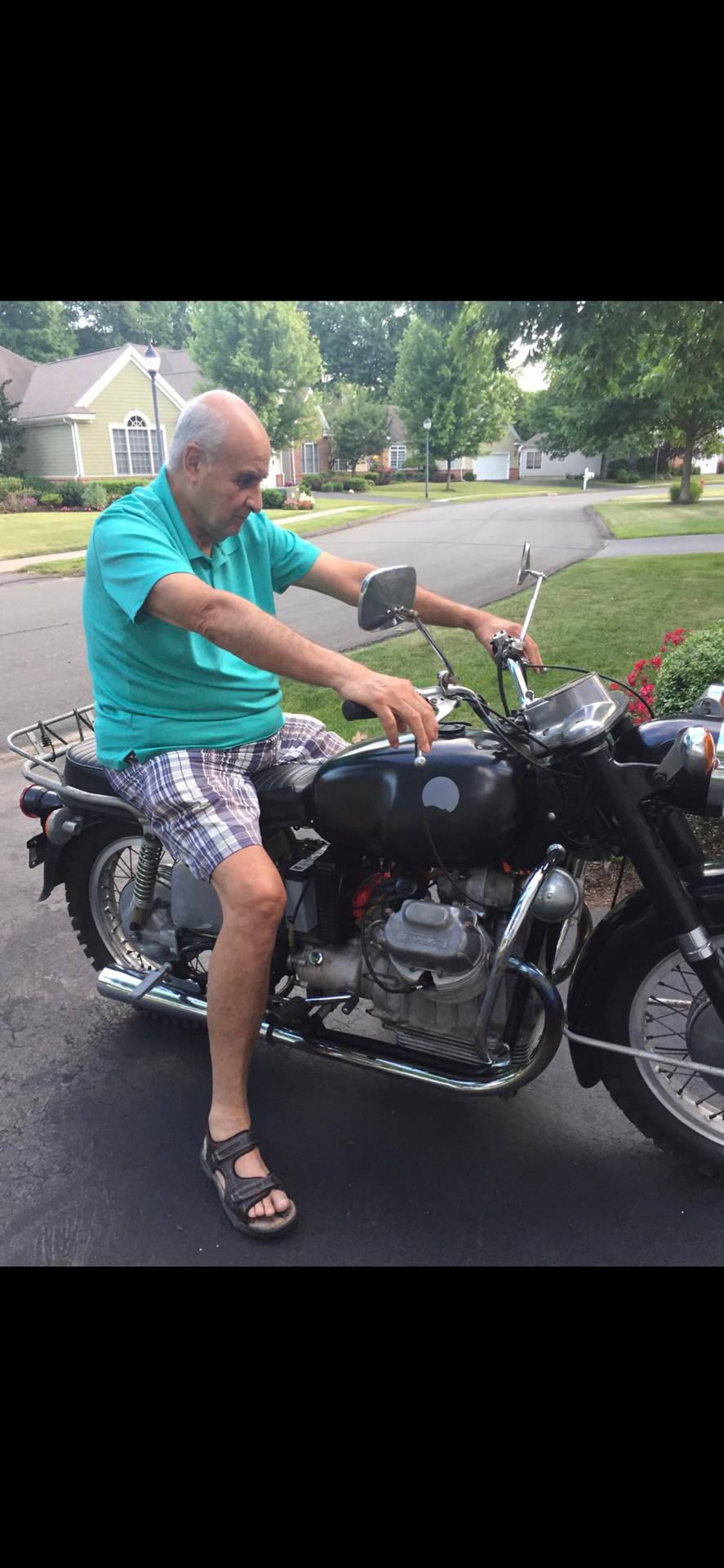 Former owner rides his bike after 40 years in storage. I bought it from him on Craigslist, got it running and came back a year later so he could ride it again.