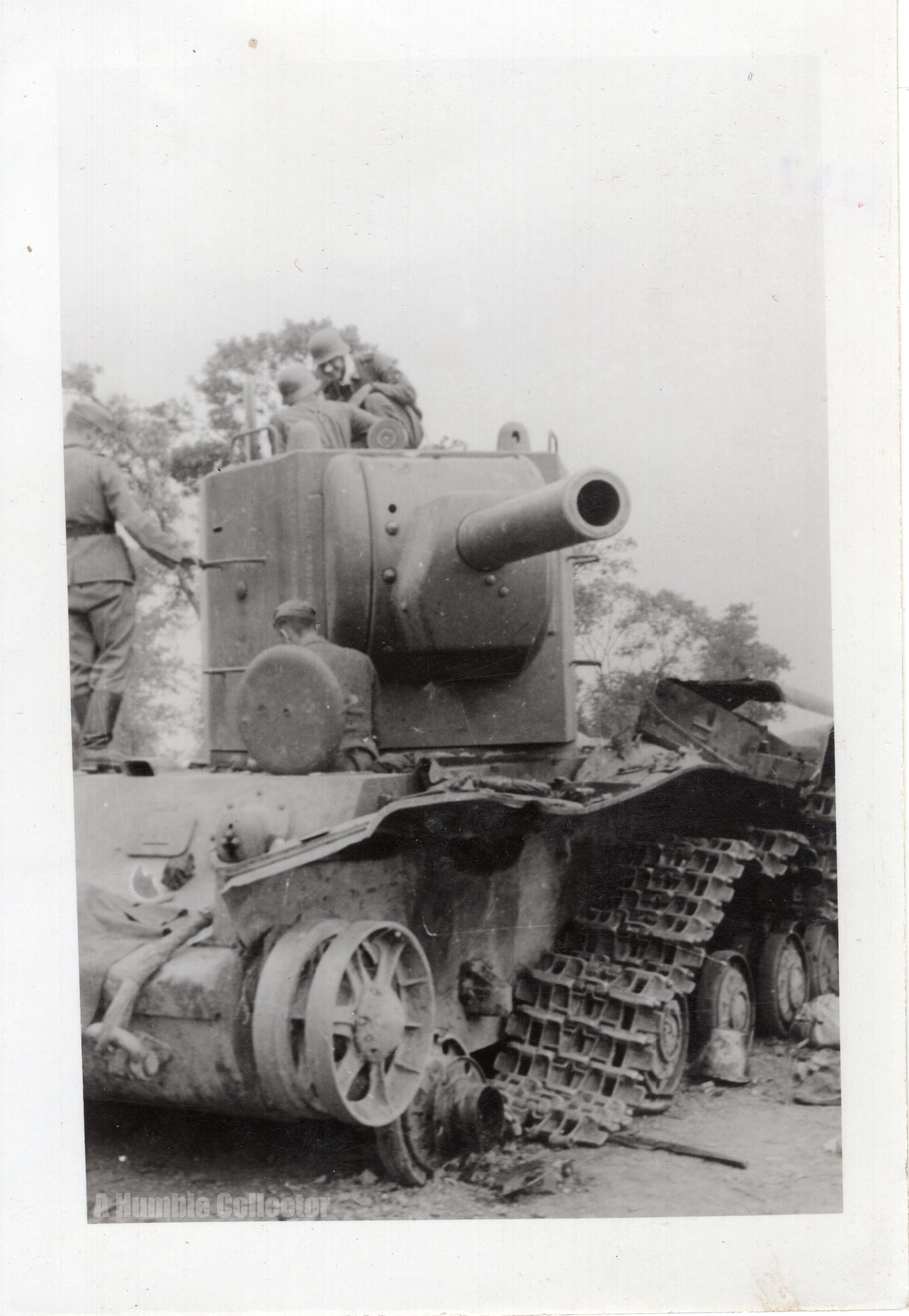 German soldiers examine a knocked out KV-2. From my personal collection ...