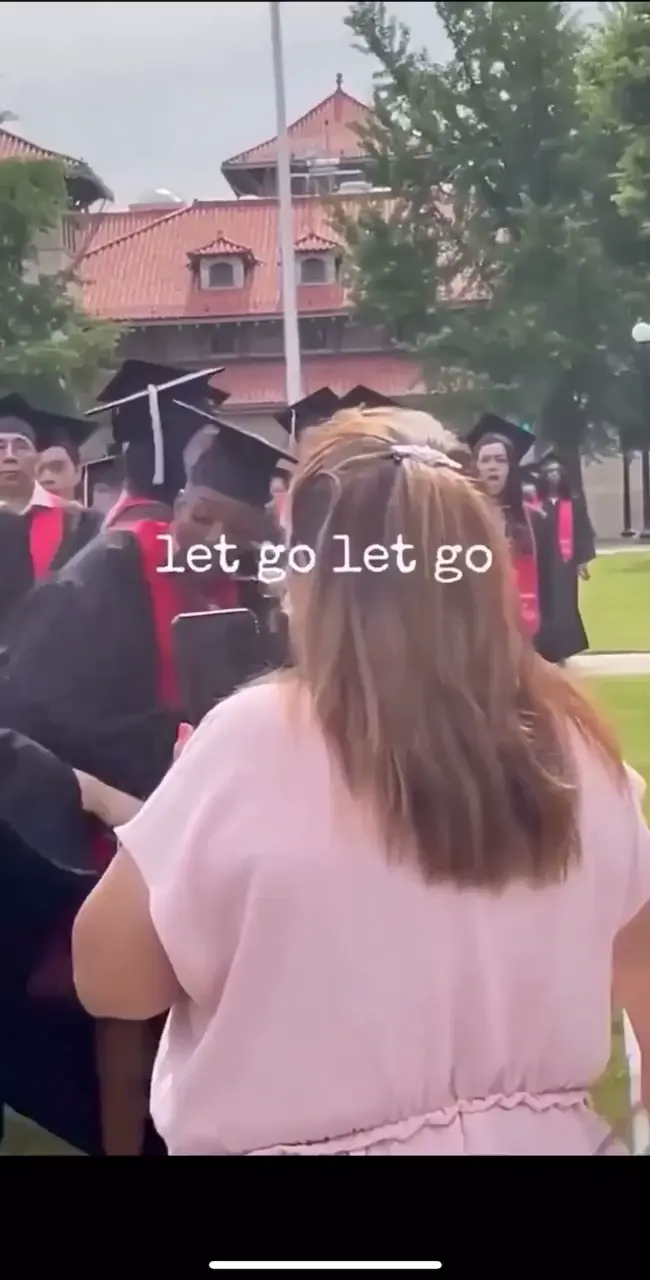 Graduate stealing the microphone