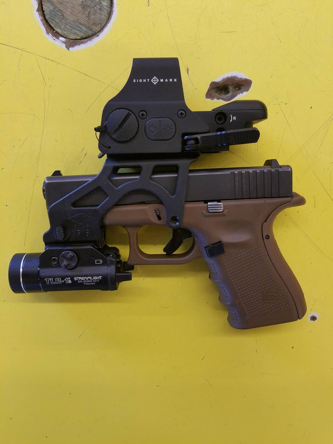 Heavily modified glock 23 just for laughs.