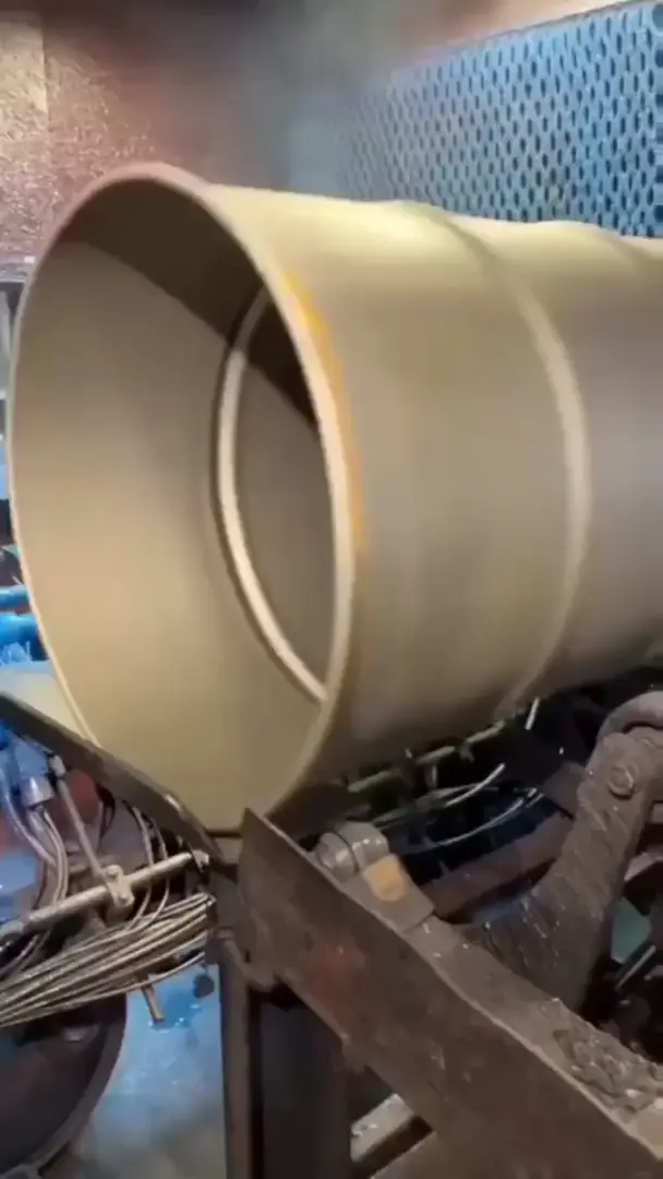 How oil drums get painted.
