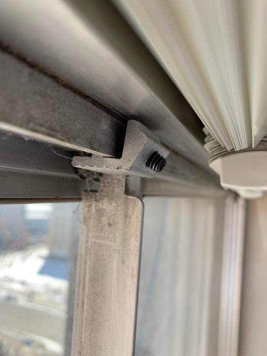 How to remove this so I can open my dorm room window?