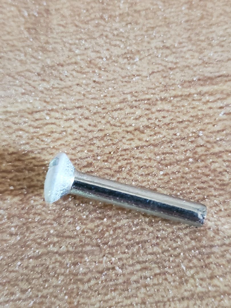 I came across an unthreaded outlet screw out of package. Never have seen this before. Have you?