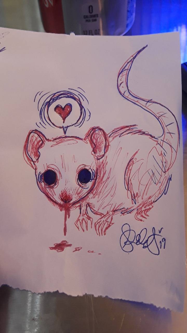 I doodled a creepy lil rat baby on receipt paper at work