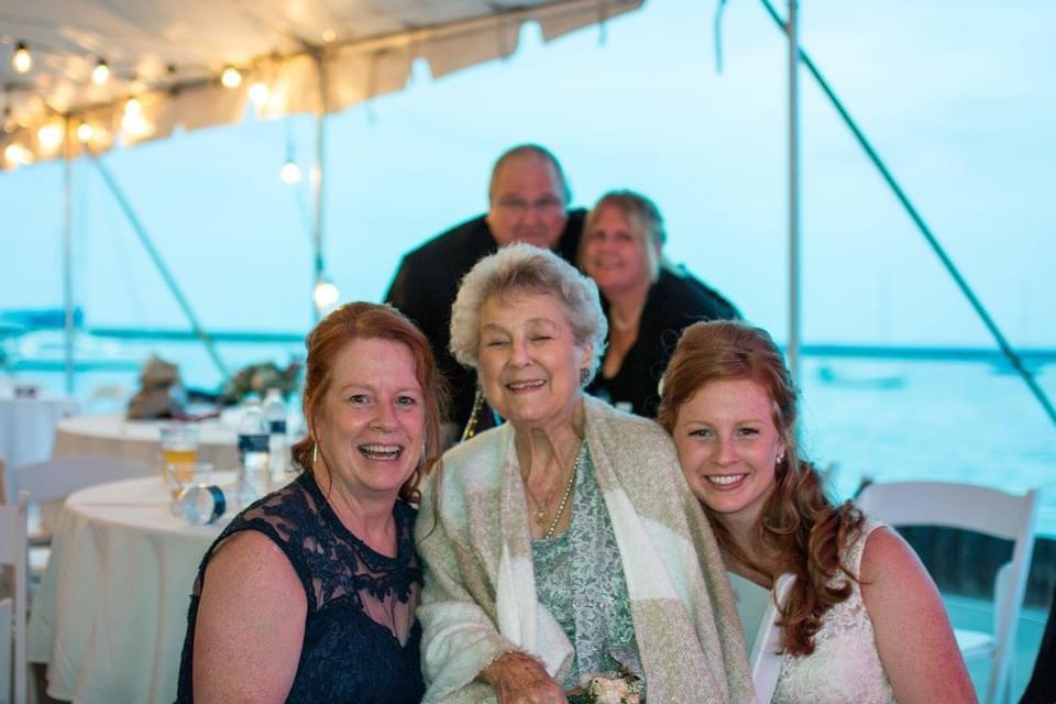 I love this photo of me, my mom, and my late grandma. Can someone please remove the “photo bombers” for me?