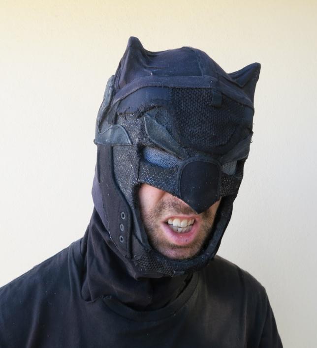I made a Batman cowl from the cut up pieces of old shoes.