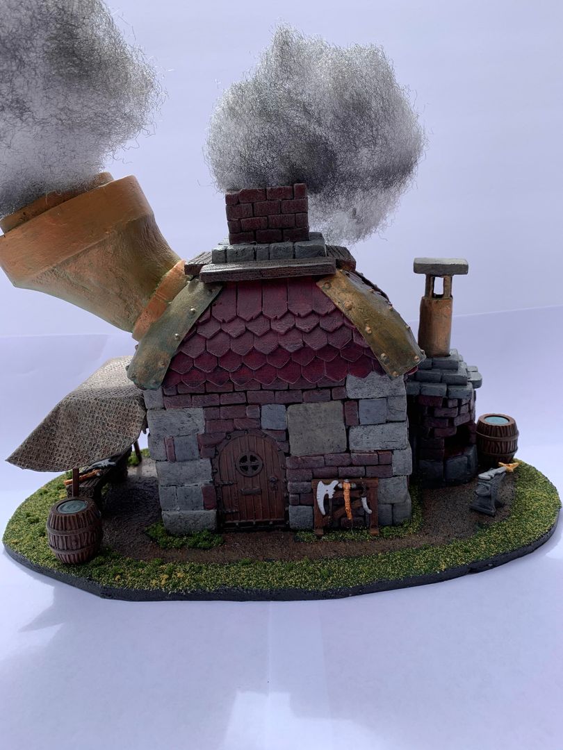 I made this blacksmith complete with a light up forge on the right and a storefront on the left. Let me know what you think!