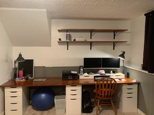 IKEA hack that looks kinda like a built in desk unit. 3 white Alex drawer units, 2 Gerton table tops, one Alex add on unit on the top...2 coats of Varathane Stain &amp; Poly on the gerton table tops and boom. Nice big old WFH station.