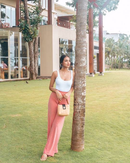 Is she wearing a bra?