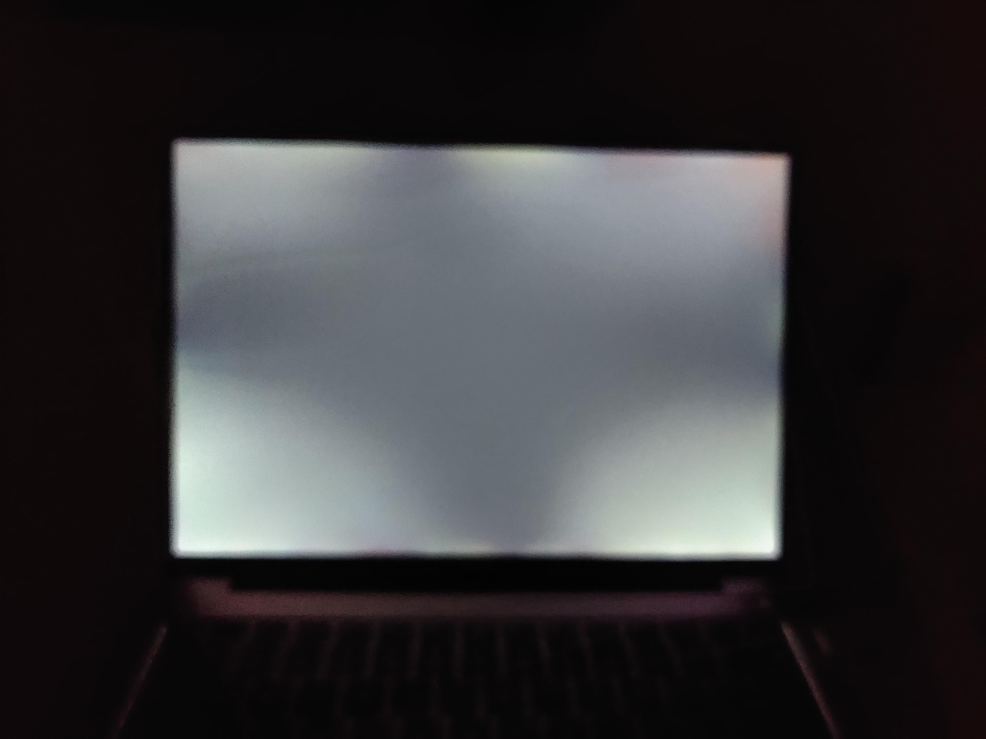 Normal Backlight Is this a normal backlight bleeding? Photo was taken in a pitch black ...