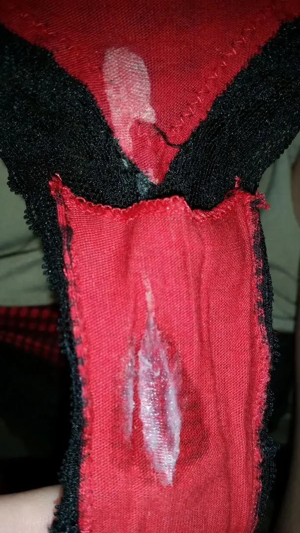 Woman showing dirty panties with wet panty nectar and underwear marks on the gusset