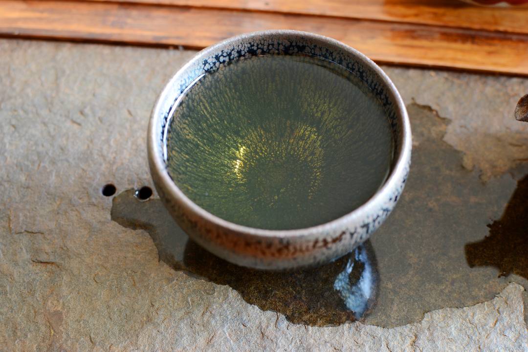 Li Haicheng Jianzhan Teacup with raw Puer [OC] [3000 X 2000]