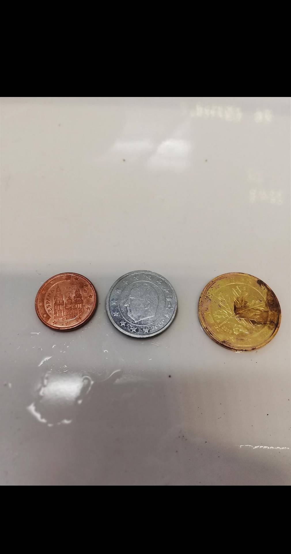 Making silver and gold out of a copper coin at school.