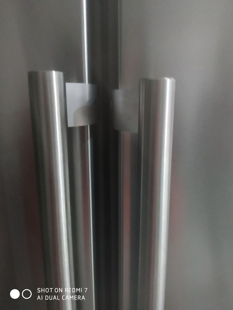 Matching fridge and freezer set. Handles are not equal
