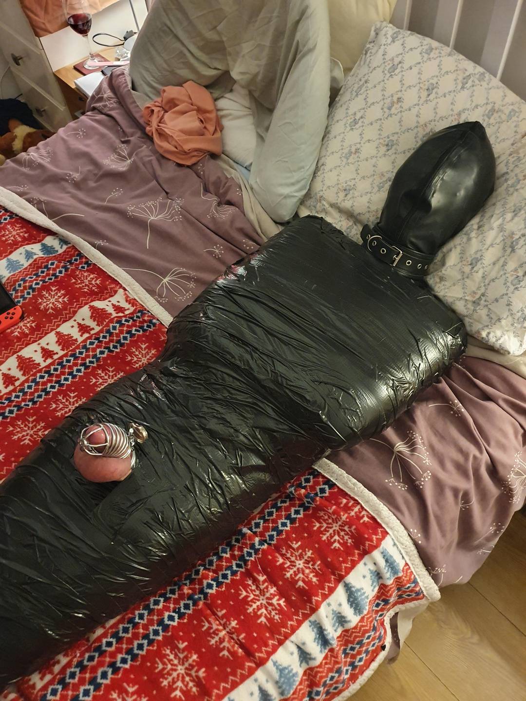 Me heavily &amp; tightly mummified in black duct tape last night for few hours with chastity on. Bliss.