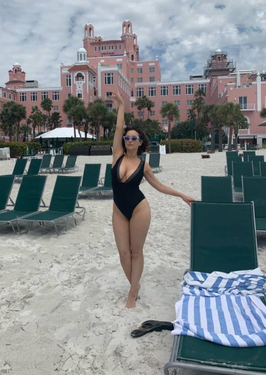 Milana Vayntrub at the beach
