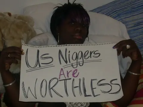 Mixed raceplay body writing and signs featuring Black and white women from JesusRaves