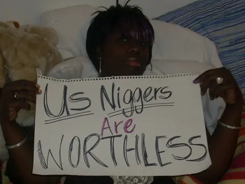Mixed raceplay body writing and signs featuring Black and white women from JesusRaves