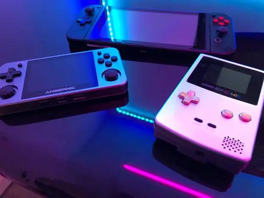 My all metal handhelds. Boxy pixel Switch and GBC. RG350M. | Scrolller