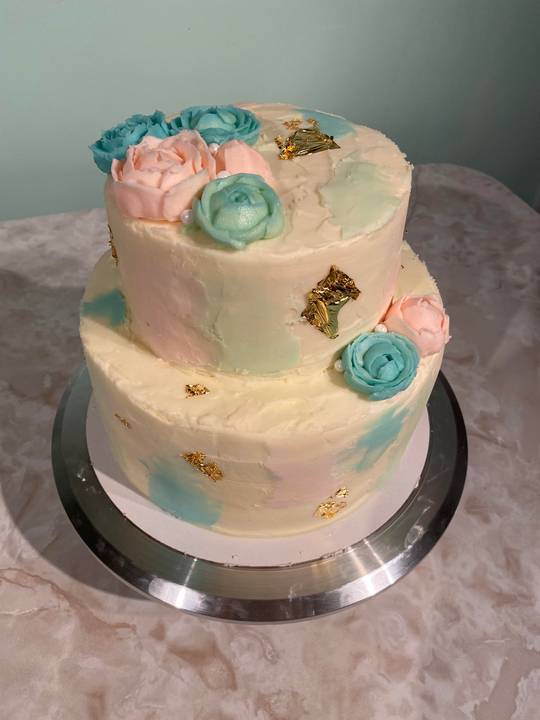 My first homemade wedding cake! The couple was very pleased and it was an honor.