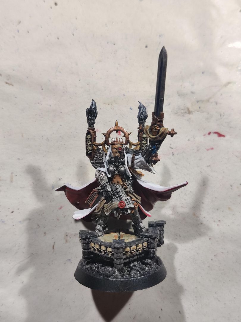 My first SoB model, primed black before realizing I wanted her to be my Argent Shroud canoness