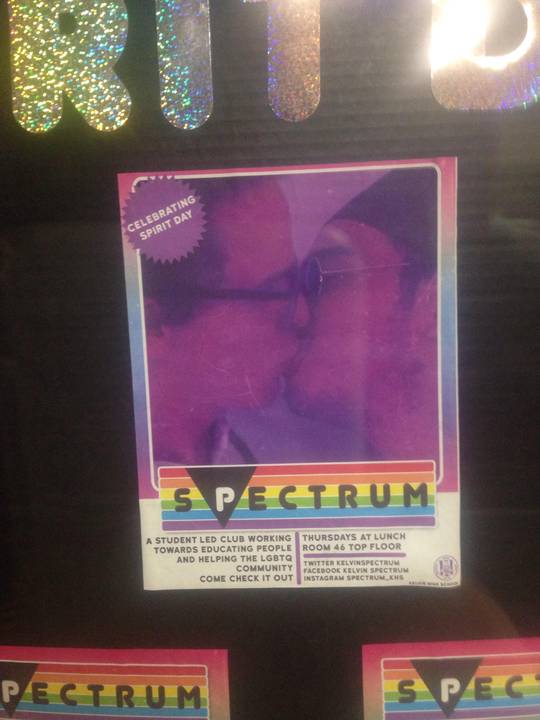 My schools LGBT group has a poster of gay retard and papa kissing