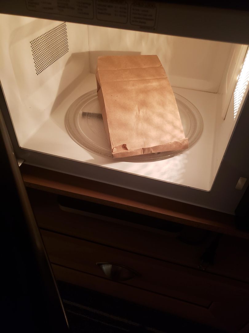 No popcorn machine? No problem. Kernels in a paper bag (like 1/3 cup) for 1:30 ish minutes in the microwave.