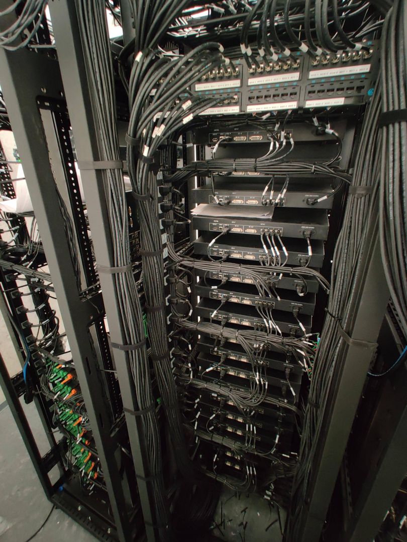 Not the prettiest but I'm proud of it, Video Wall Processor rack for video Wall/Floor/Ceiling ( rack 1 of 3 ) 96 patches (Cat6 shielded) and 100 (Cat5 shielded) output interconnects for 25 processors running 2500 LED Panels.