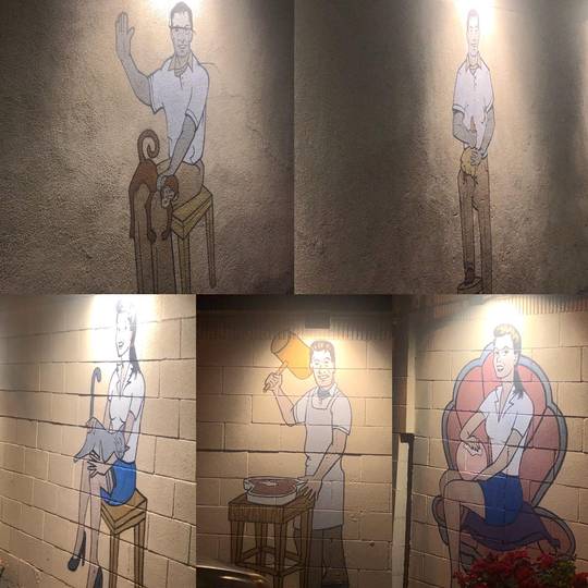 Art in parking lot of adult store in Cali