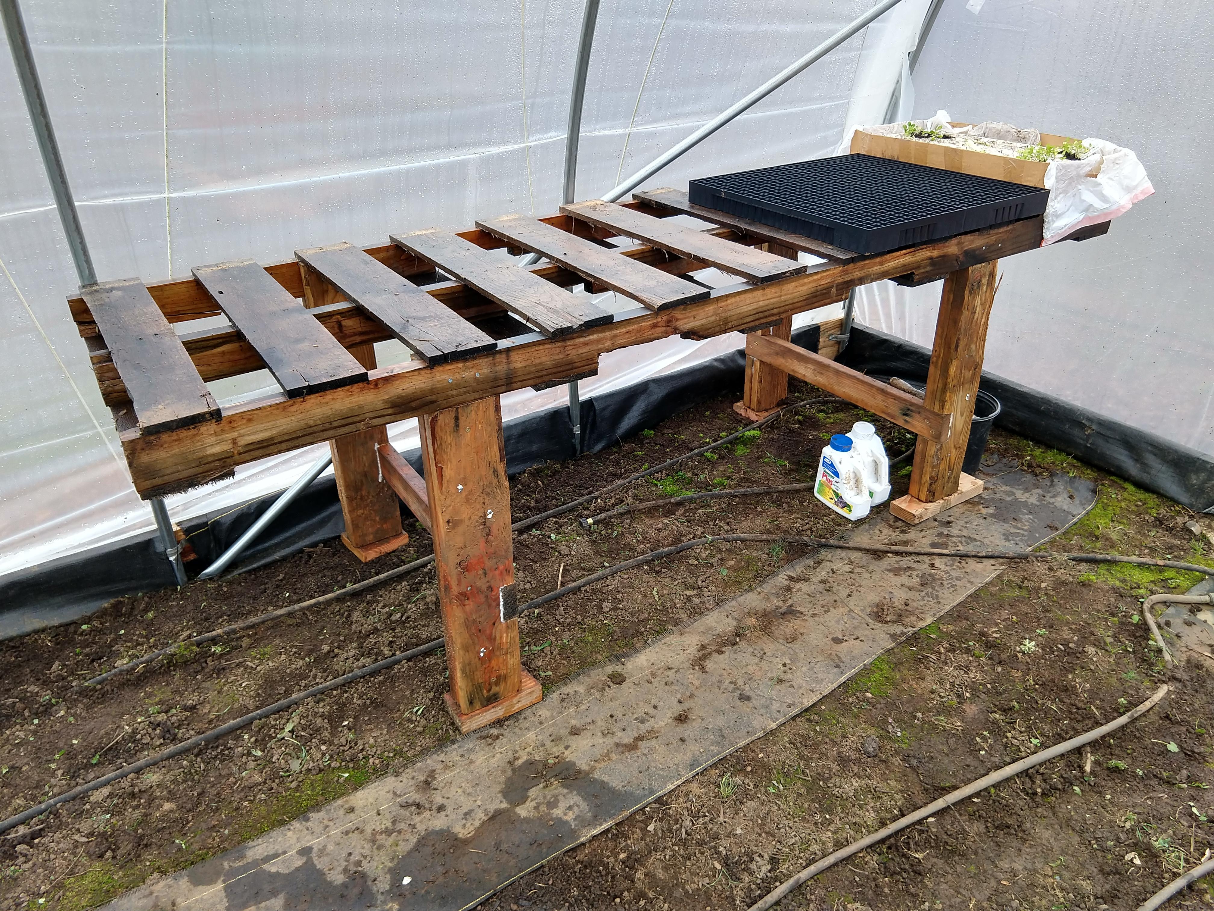 Planting table in pallet and scrap construction lumber. | Scrolller