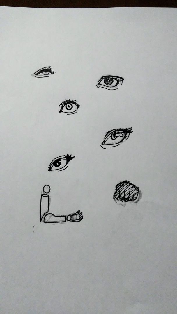 Practiced drawing eyes during school time (ignore the screwed up hand)