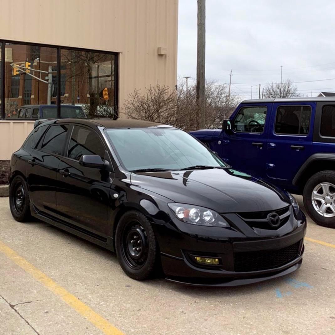Recently got a front lip installed on my Mazdaspeed3 after owning the car for over 10 years now! Still in winter mode with the steel wheels and winter tires on though. What do you guys think?