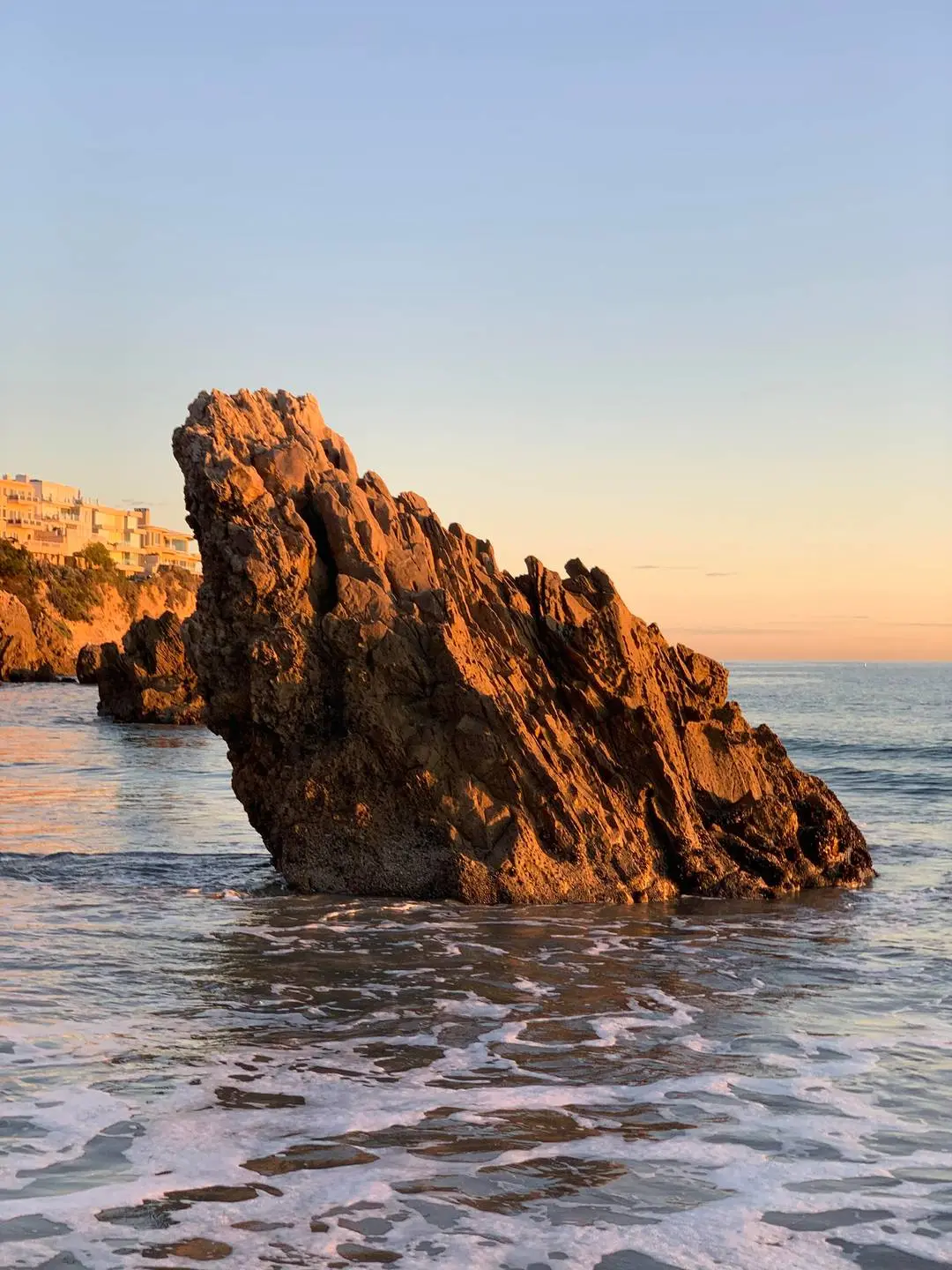 Scrolller Rocks Rock in the ocean | Scrolller