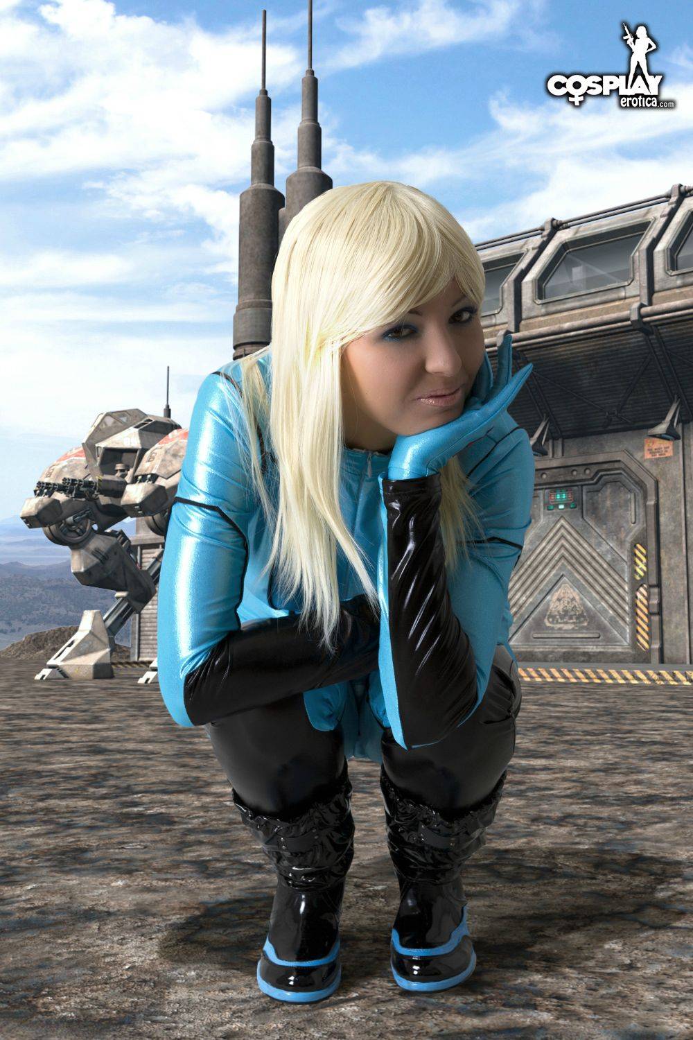 Mea Lee as Samus Aran from Metroid in a shiny blue bodysuit and black boots