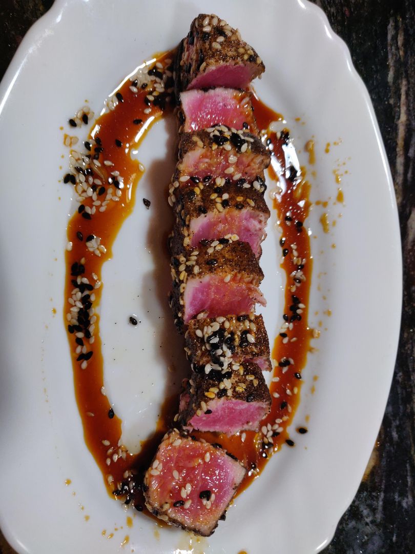 Seared black pepper sesame tuna with soy/ponzu sauce