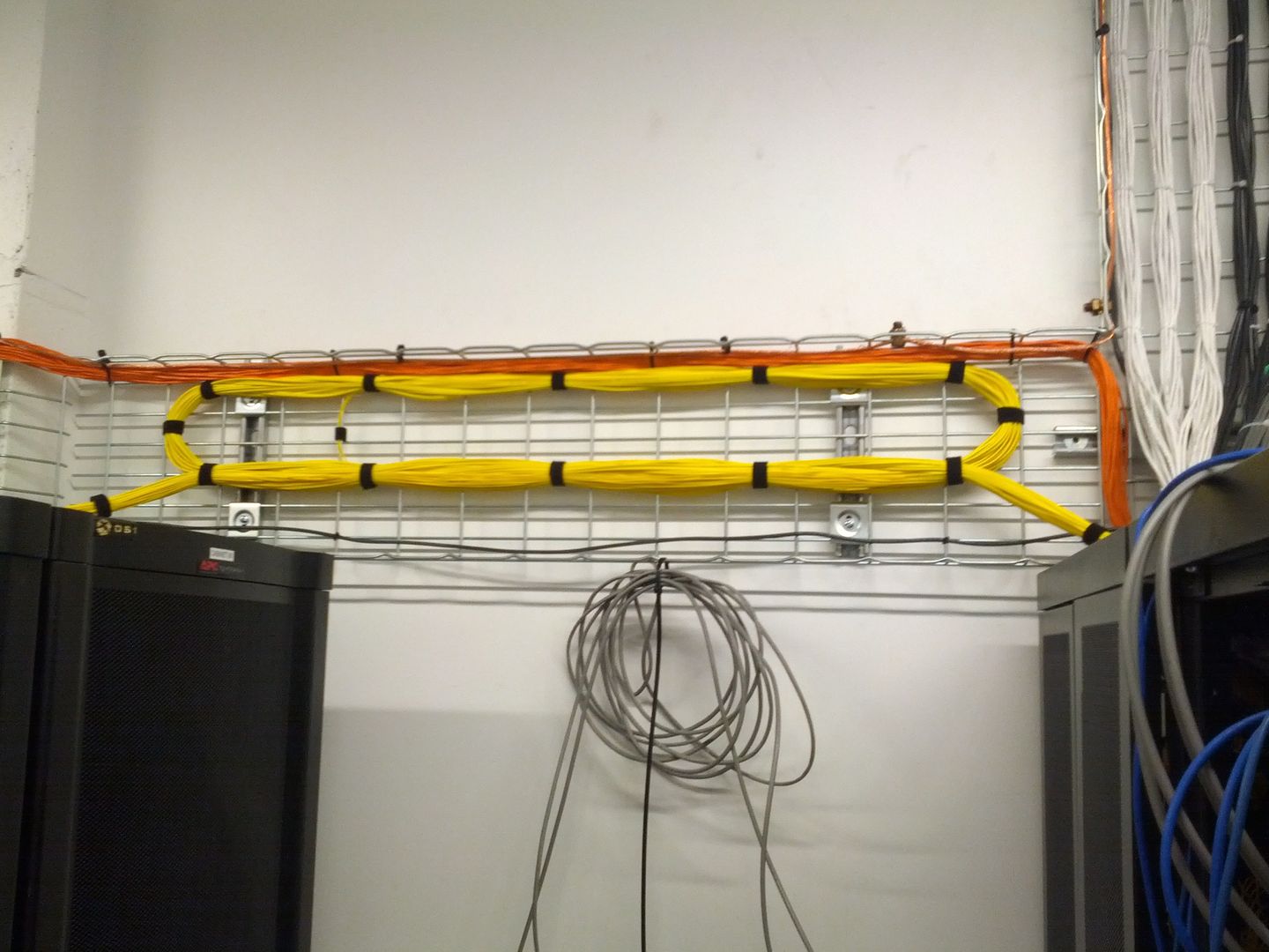Someone bought the wrong length of fiber patch cables... I tried to make it look good.