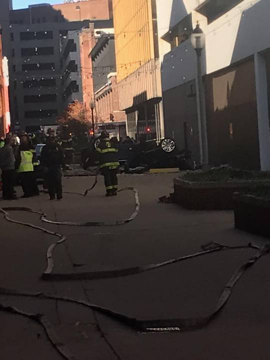 Someone just drove off a parking garage downtown