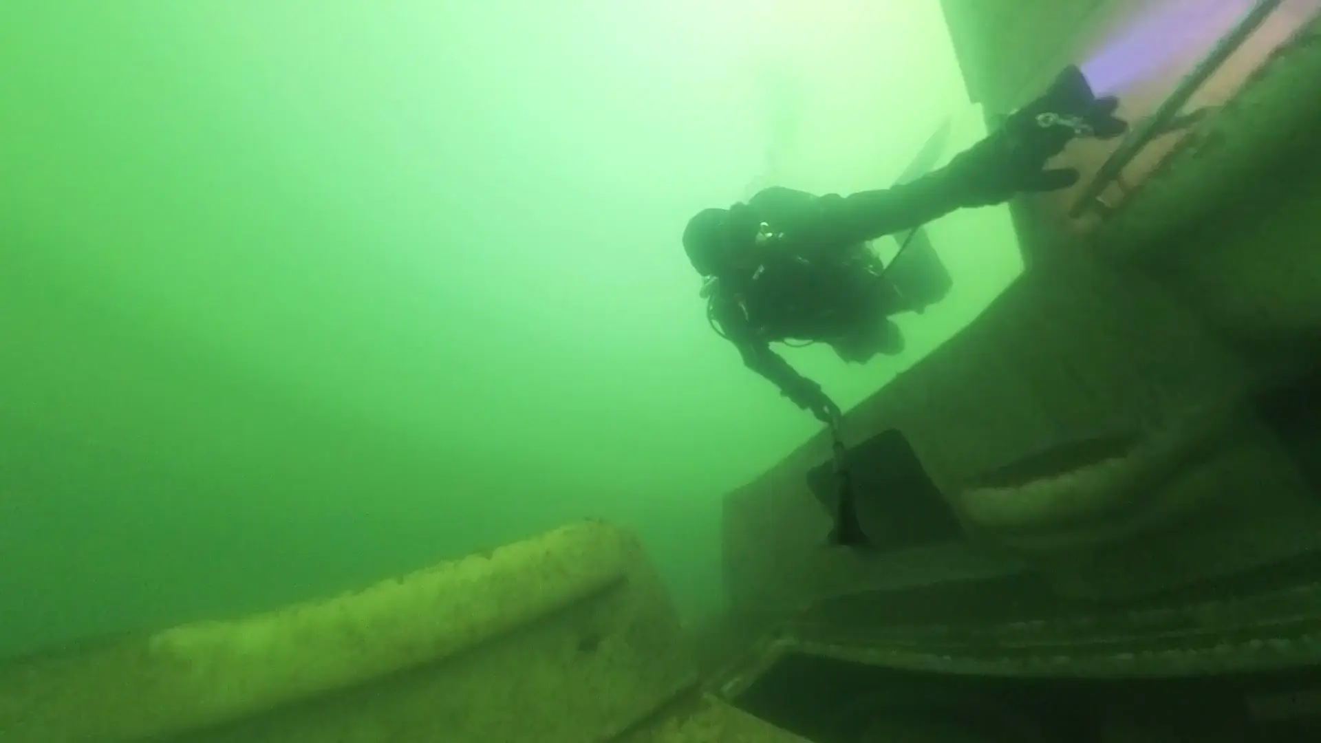 Swimming through a sunken boat