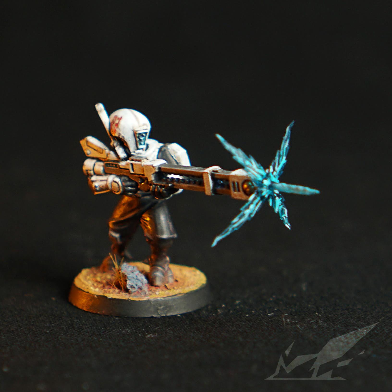 Tau Pathfinder with rail rifle and muzzle flash | Scrolller