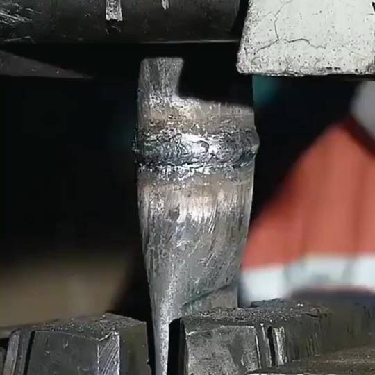 Testing the tensile strength of a weld