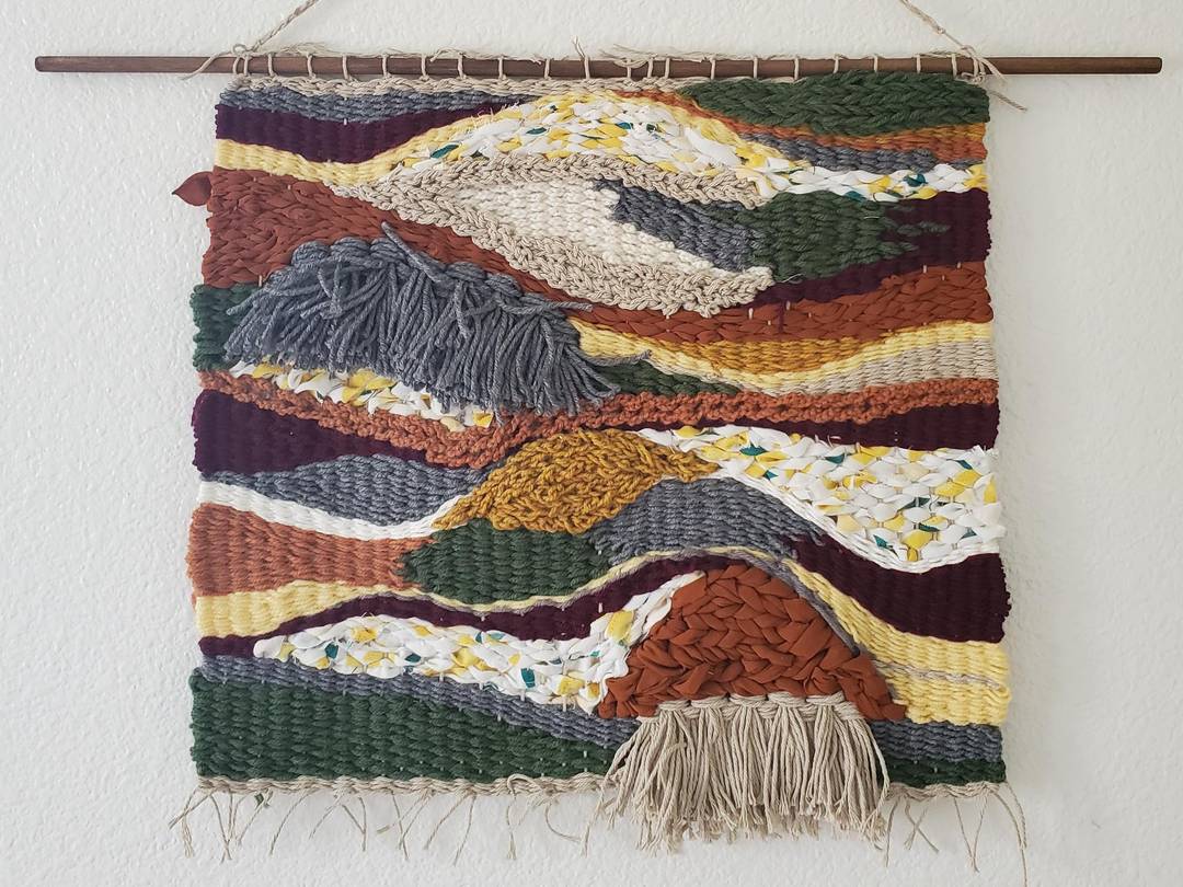 The first of many! Made from a cardboard box loom.