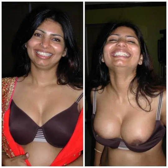 Busty Indian NRI aunty smiling and laughing in an orange sari and brown bra with a nose ring