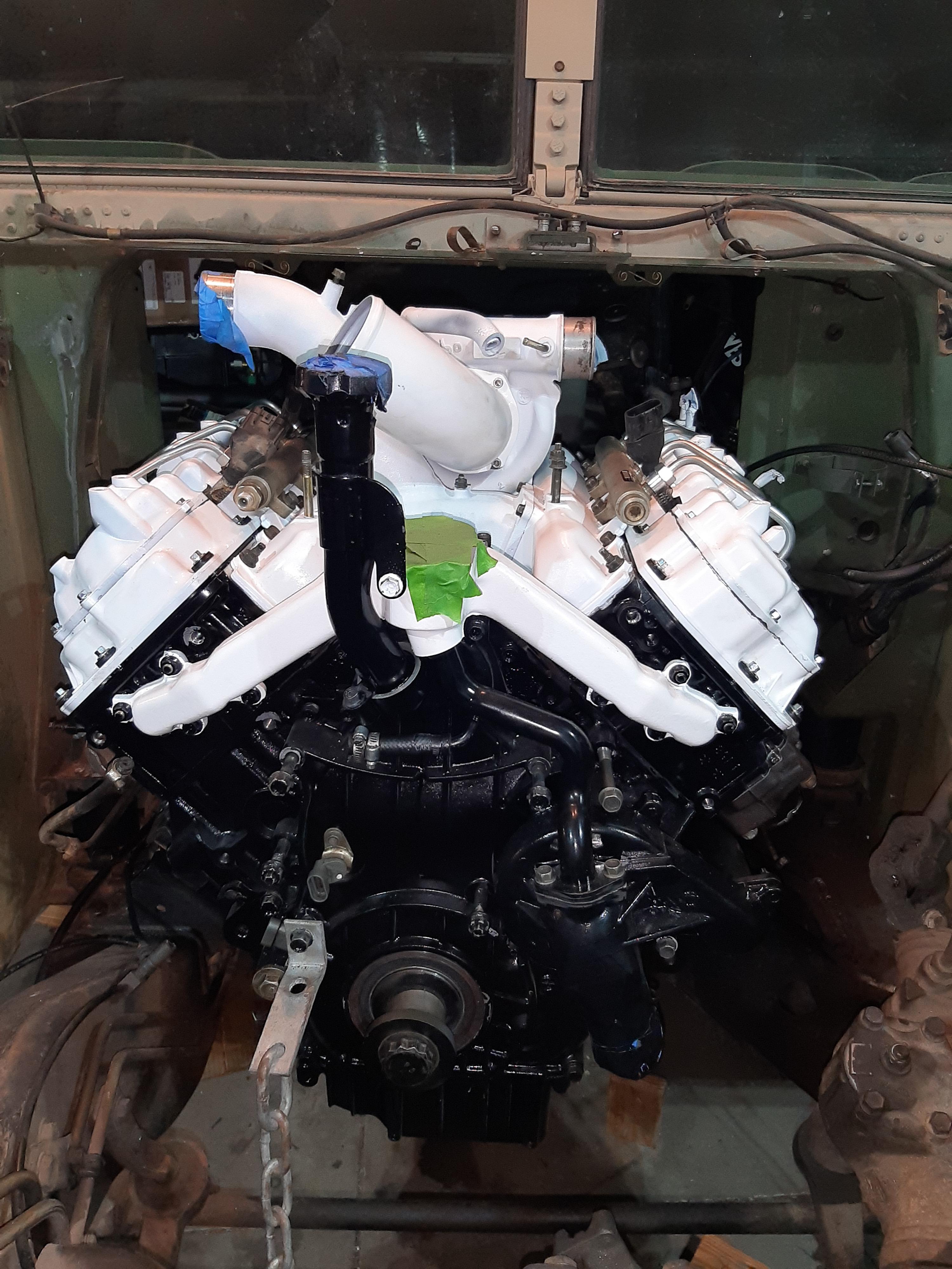 The LB7 is a tight fit in the 94 Humvee | Scrolller