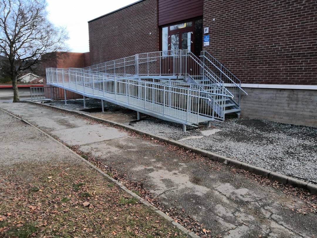 The wheel chair-ramp at my school with a 20 cm drop at the end