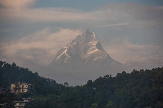 This photo made it to the front page of EarthPorn + Reddit the other day, but was quickly taken down because of the building. Is this the right place for me? Here's a photo of a ridiculous mountain + building I took last year in Nepal [OC] [4608 × 3072]