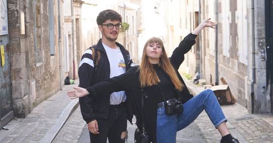 Two different types of "pull an awkward pose"