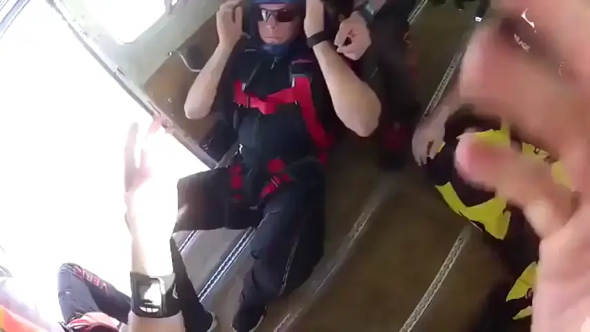 Two skydivers collide mid-air, knocking one of them unconscious. Camera man proceeds to pull some mission impossible shit and saves his life.