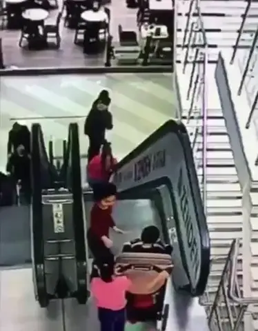 Unattended kids fall down escalator