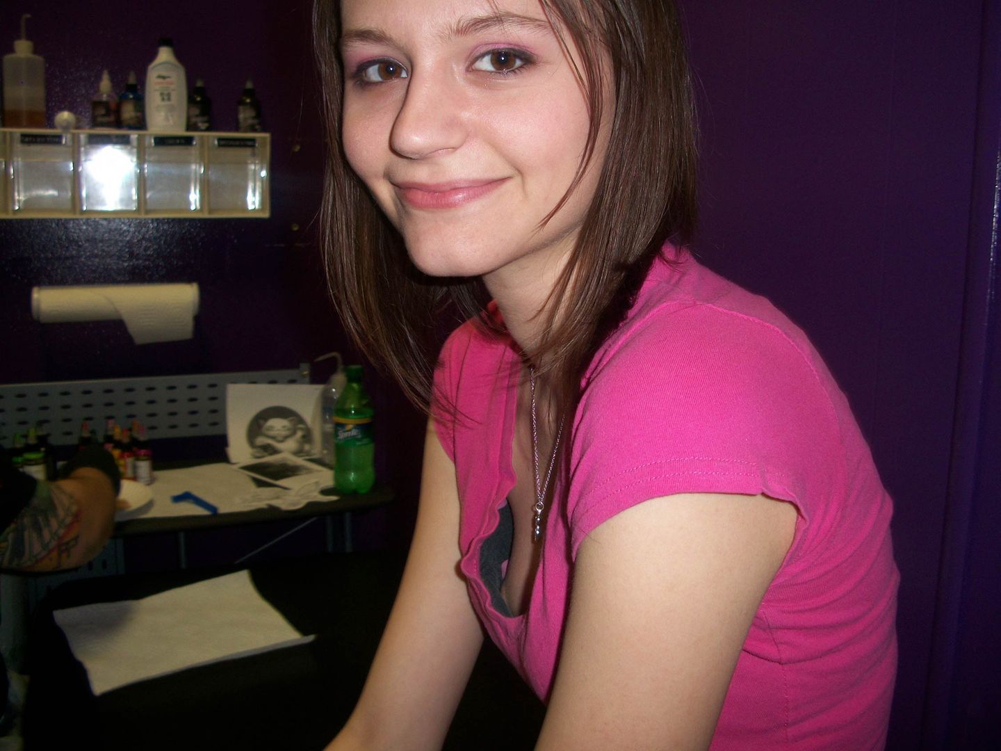 waiting for her tattoo